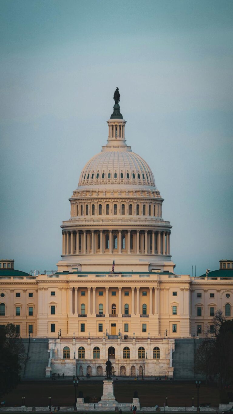 US Capitol building at dusk, seat of the Congress that will decide federal AI policy in 2026